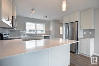 Photo 13: 5720 JUCHLI Avenue in Edmonton: Zone 27 Attached Home for sale : MLS®# E4310447