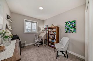 Photo 24: 99 Wolf Creek Avenue SE in Calgary: C-281 Row/Townhouse for sale : MLS®# A2130756