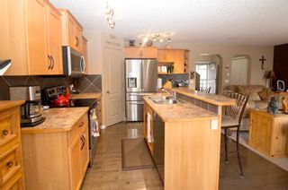 Photo 7: 129 Brightondale Parade SE in Calgary: New Brighton Detached for sale : MLS®# A1243145