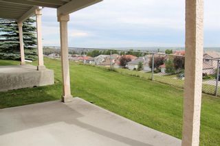 Photo 34: 57 Hamptons Link NW in Calgary: Hamptons Row/Townhouse for sale : MLS®# A1240485