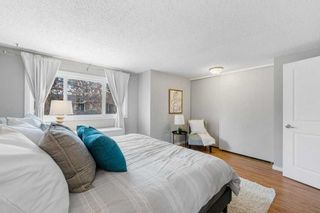 Photo 16: 563 Queenston Gardens SE in Calgary: Queensland Row/Townhouse for sale : MLS®# A2126181