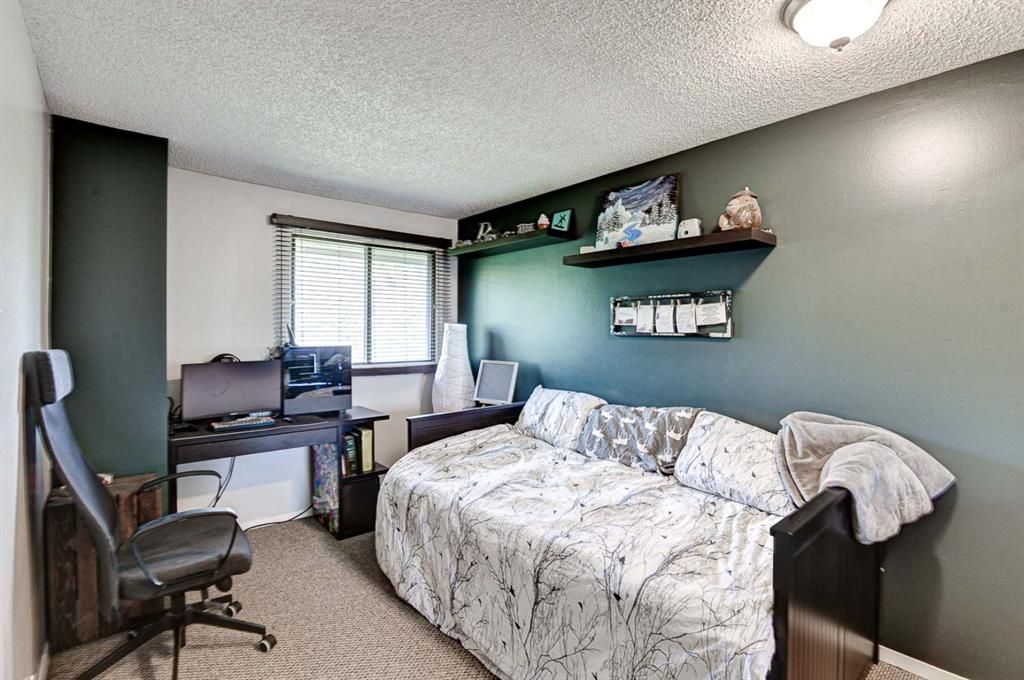 Photo 16: Photos: 18 99 Midpark Gardens SE in Calgary: Midnapore Row/Townhouse for sale : MLS®# A1230199