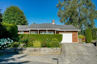 Photo 1: 15049 SPENSER Drive in Surrey: Bear Creek Green Timbers House for sale : MLS®# R2622598