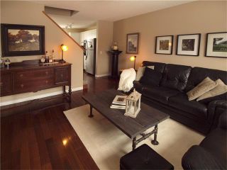 Photo 7: 178 BRIDLEGLEN Road SW in Calgary: Bridlewood House for sale : MLS®# C4103695