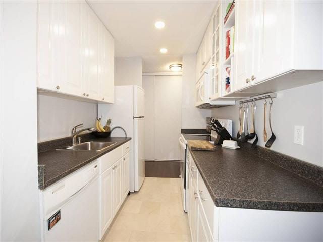 Nicely updated kitchen featuring lots of cabinet space and a pantry closet.