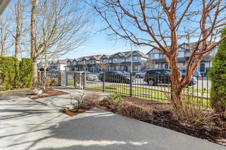 Photo 2: 122 6671 121 Street in Surrey: West Newton Townhouse for sale in "West Newton" : MLS®# R2880217