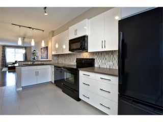 Photo 3: 312 ASCOT Circle SW in Calgary: Aspen Woods House for sale : MLS®# C4003191