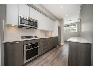 Photo 1: 15 5132 CANADA Way in Burnaby: Burnaby Lake Condo for sale in "SAVILLE ROW" (Burnaby South)  : MLS®# R2276501