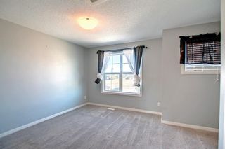 Photo 35: 725 101 Sunset Drive: Cochrane Row/Townhouse for sale : MLS®# A1258770