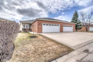 Photo 1: 39 Prominence Point SW in Calgary: Patterson Semi Detached for sale : MLS®# A1076350