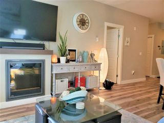 Photo 3: 108 19936 56 Avenue in Langley: Langley City Condo for sale in "Bearing Pointe" : MLS®# R2442185