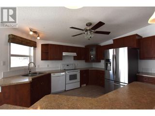 Photo 11: 12560 Westside Road Unit# 118 in Vernon: House for sale : MLS®# 10306327