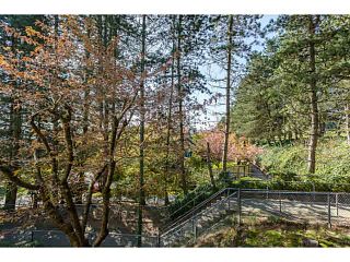 Photo 5: 203 2733 ATLIN Place in Coquitlam: Coquitlam East Condo for sale in "ATLIN COURT" : MLS®# V1142797
