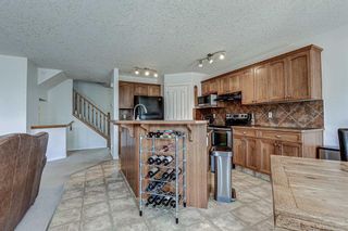 Photo 14: 28 Cougarstone Square SW in Calgary: Cougar Ridge Detached for sale : MLS®# A1099416