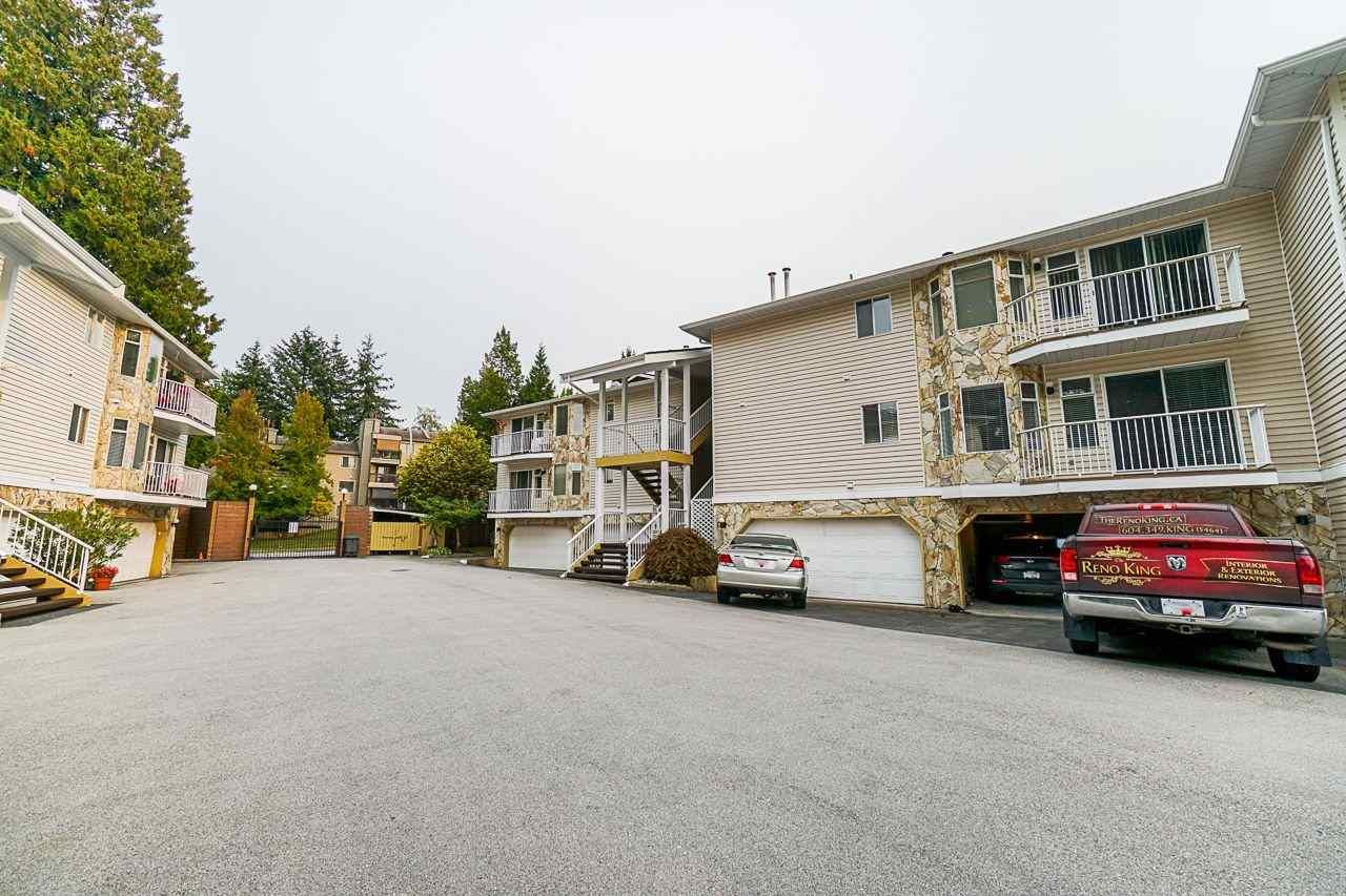 Photo 1: Photos: 212 10584 153 Street in Surrey: Guildford Townhouse for sale in "Glenwood Village" (North Surrey)  : MLS®# R2504798