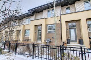 Photo 1: 24 Aspen Hills Common SW in Calgary: Aspen Woods Row/Townhouse for sale : MLS®# A1209007