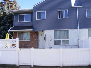 Main Photo: 61 4769 Hubalta Road SE in Calgary: Dover Row/Townhouse for sale : MLS®# A2088881