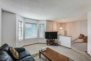 Photo 3: 110 Erin Meadow Crescent SE in Calgary: Erin Woods Detached for sale : MLS®# A1237787