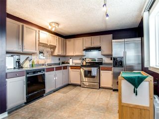 Photo 8: 27 Woodmont Green SW in Calgary: Woodbine House for sale : MLS®# C4022488