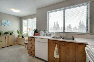Photo 10: 143 Woodvale Bay SW in Calgary: Woodlands Row/Townhouse for sale : MLS®# A2022754