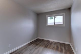 Photo 13: 104 2720 RUNDLESON Road NE in Calgary: Rundle Row/Townhouse for sale : MLS®# C4221687