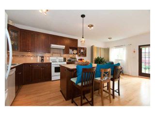 Photo 4: 7635 DAVIES Street in Burnaby: Edmonds BE House for sale (Burnaby East)  : MLS®# V850673