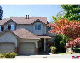 Photo 1: 13900 HYLAND Road in Surrey: East Newton Townhouse for sale in "Hyland Grove" : MLS®# F2617473