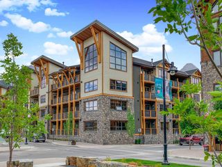 Photo 1: 102 905 Spring Creek Drive: Canmore Apartment for sale : MLS®# A2123278