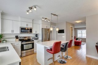 Photo 6: 127 Fireside Parkway: Cochrane Row/Townhouse for sale : MLS®# A1212822