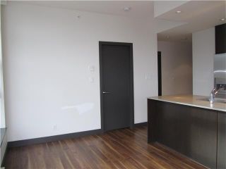Photo 6: 404 1088 W 14TH Avenue in Vancouver: Fairview VW Condo for sale in "COCO" (Vancouver West)  : MLS®# V1044068