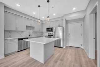 Main Photo: 212 200 SHAWNEE Square SW in Calgary: Shawnee Slopes Apartment for sale : MLS®# A2040299