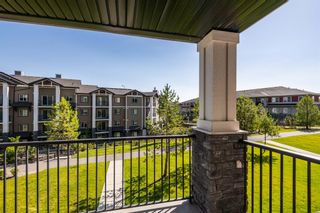 Photo 2: 2207 130 Panatella Street NW in Calgary: Panorama Hills Apartment for sale : MLS®# A2000512