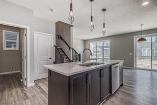 Photo 9: 128 Carringsby Manor NW in Calgary: Carrington Detached for sale : MLS®# A2044458