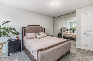 Photo 11: 14 Coachway Gardens SW in Calgary: Coach Hill Row/Townhouse for sale : MLS®# A2050354