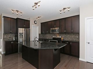 Photo 11: 76 PANORA View NW in Calgary: Panorama Hills House for sale : MLS®# C4145331
