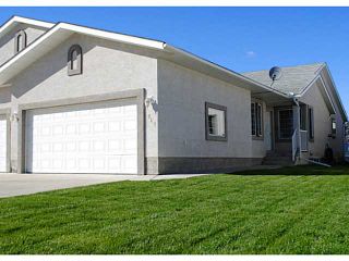Photo 1: 110 RIVERSIDE Crescent NW: High River Residential Attached for sale : MLS®# C3586695