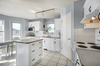 Photo 10: 28 Arbour Ridge Court NW in Calgary: Arbour Lake Detached for sale : MLS®# A2033147