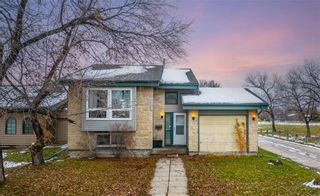 Photo 1: 69 Sun Valley Drive in Winnipeg: All Season Estates Residential for sale (3H)  : MLS®# 202329931