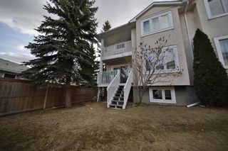 Photo 3: 10 388 Sandarac Drive NW in Calgary: Sandstone Valley Row/Townhouse for sale : MLS®# A1181075