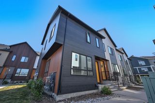 Photo 5: 702 Redstone Crescent NE in Calgary: Redstone Row/Townhouse for sale : MLS®# A2075520