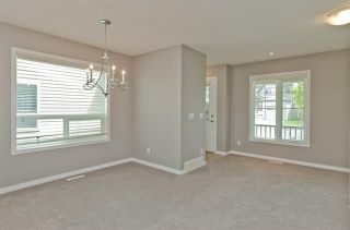 Photo 9: 3071 WINDSONG Boulevard SW: Airdrie Row/Townhouse for sale : MLS®# C4300138