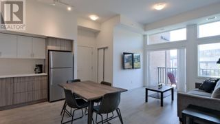 Photo 2: 625 Academy Way Unit# PH11 in Kelowna: House for sale : MLS®# 10303006