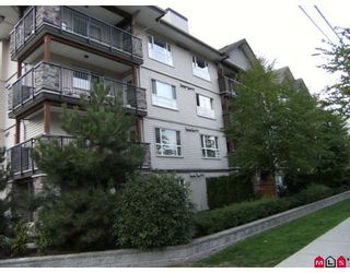 Photo 1: 203 5465 203RD Street in Langley: Langley City Condo for sale in "STATION 54" : MLS®# F2919876