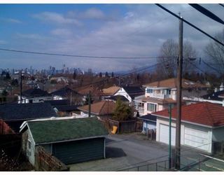 Photo 8: 2057 E 3RD Avenue in Vancouver: Grandview VE House for sale in "THE DRIVE" (Vancouver East)  : MLS®# V760209