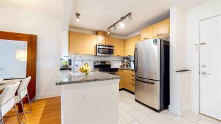 Photo 1: 313 7418 BYRNEPARK Walk in Burnaby: South Slope Condo for sale in "GREEN" (Burnaby South)  : MLS®# R2501039
