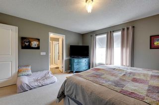 Photo 22: 35 Cougarstone Landing SW in Calgary: Cougar Ridge Detached for sale : MLS®# A2063797