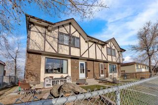 Photo 4: 7708 Hunterview Drive NW in Calgary: Huntington Hills 4 plex for sale : MLS®# A2123562