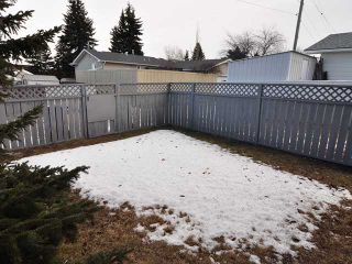 Photo 17: 7802 HUNTERQUAY Road NW in Calgary: Huntington Hills Half Duplex for sale : MLS®# C3650230