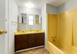 Photo 11: 209 Edgar Avenue NW: Turner Valley Detached for sale : MLS®# A1244972