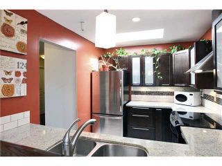Photo 1: 408 2439 WILSON Avenue in Port Coquitlam: Central Pt Coquitlam Condo for sale in "AVEBURY POINT" : MLS®# V842220